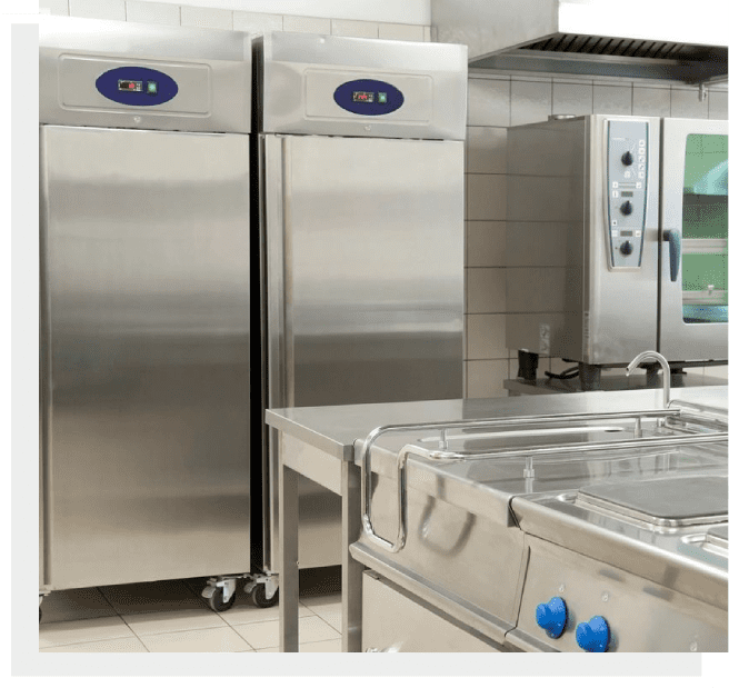 A kitchen with stainless steel appliances and a sink.